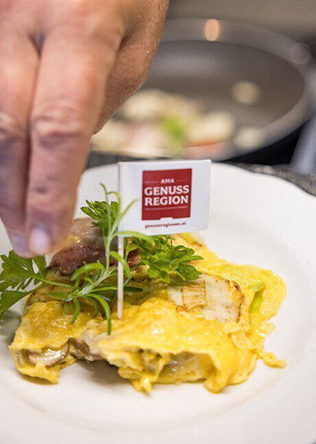 Preparation of scrambled eggs at the breakfast buffet.