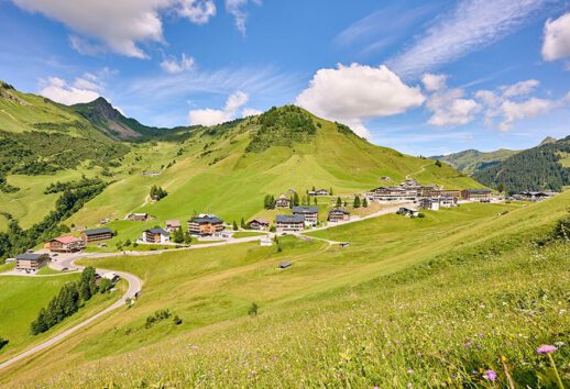 The green meadows of Faschina in summer.