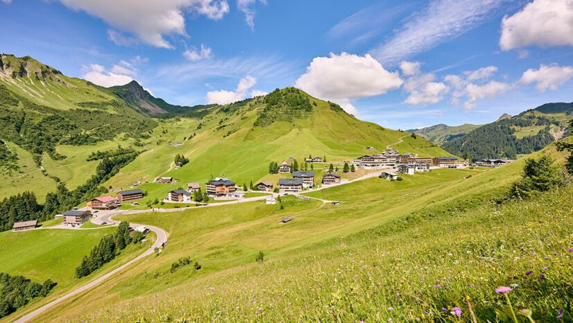 The green meadows of Faschina in summer.